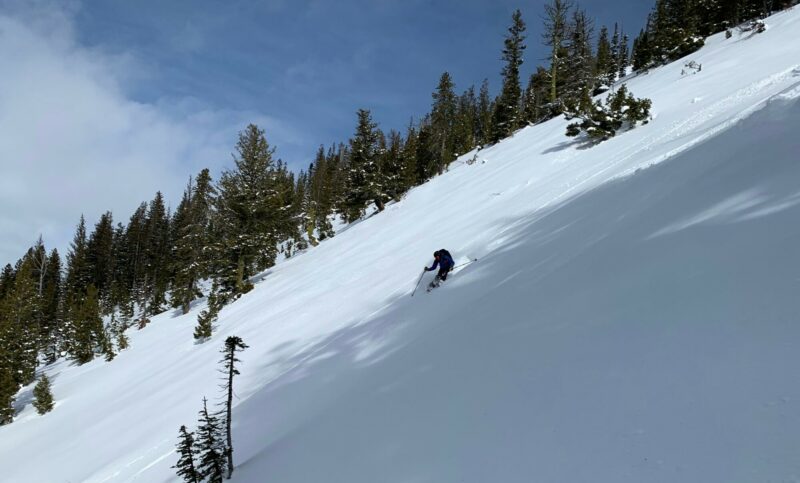 Russ enjoying a rare safe steep run. 