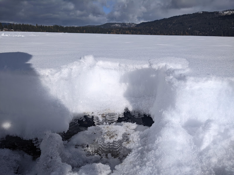 I dug away the 6 inches or so of snow, and noticed ice crystals in the form of little towers that looked like layers of a clear cake